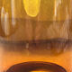 Flacon vase en verre ambré