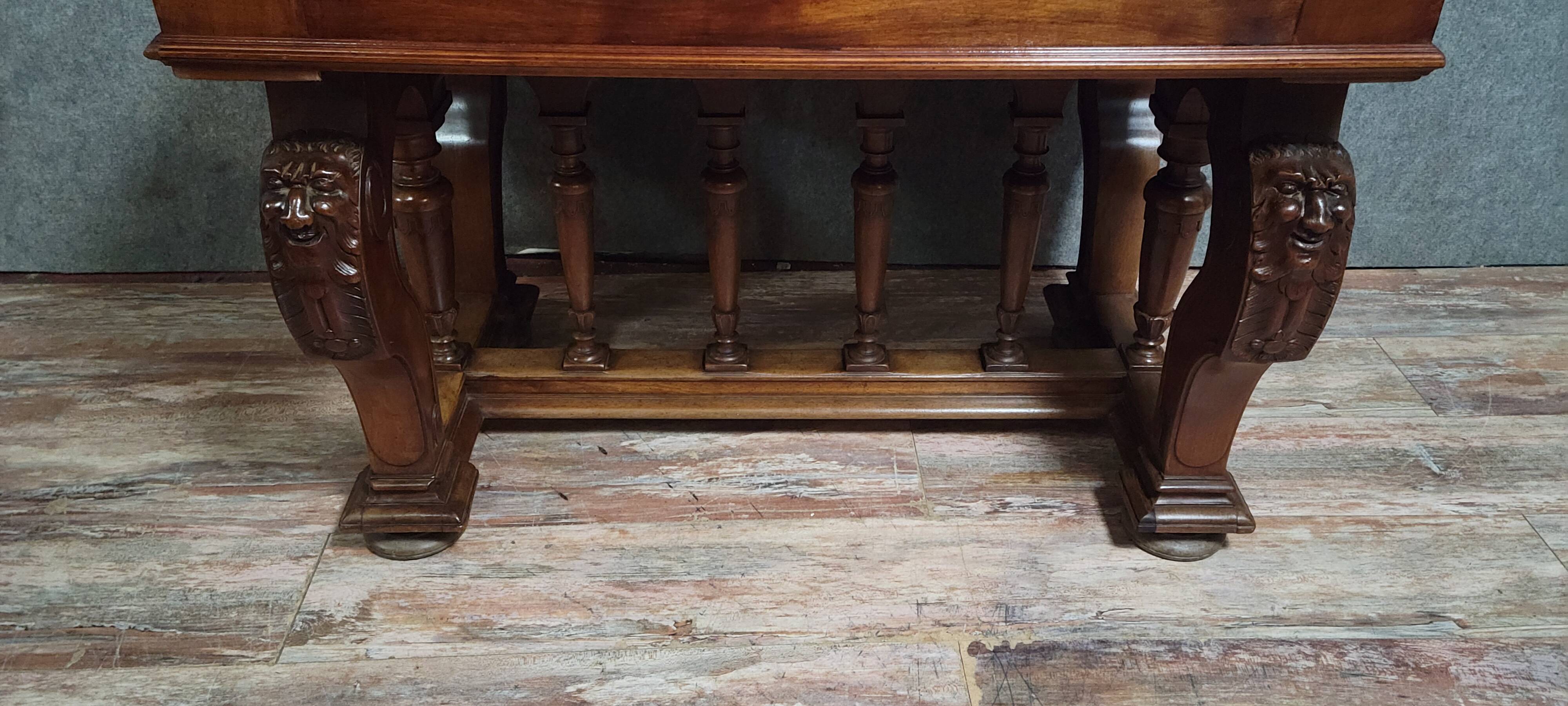 Antique desk in Renaissance style made of walnut from the late 19th century.