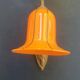 Art Deco wall light in brass with an orange globe.