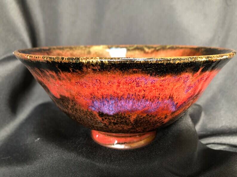 Oxblood enameled ceramic cup signed LS
