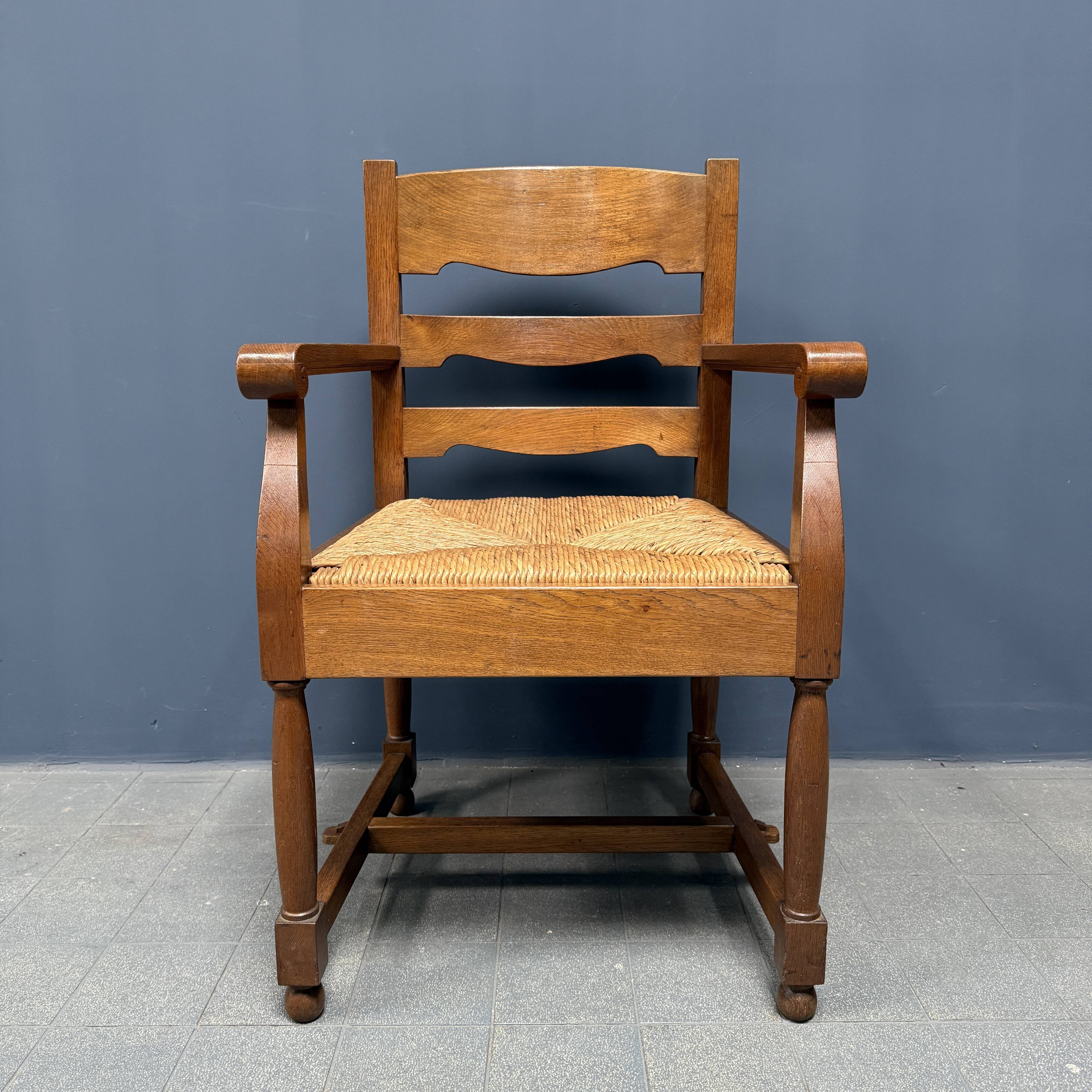 Set of two Dutch oak armchairs with rush seats