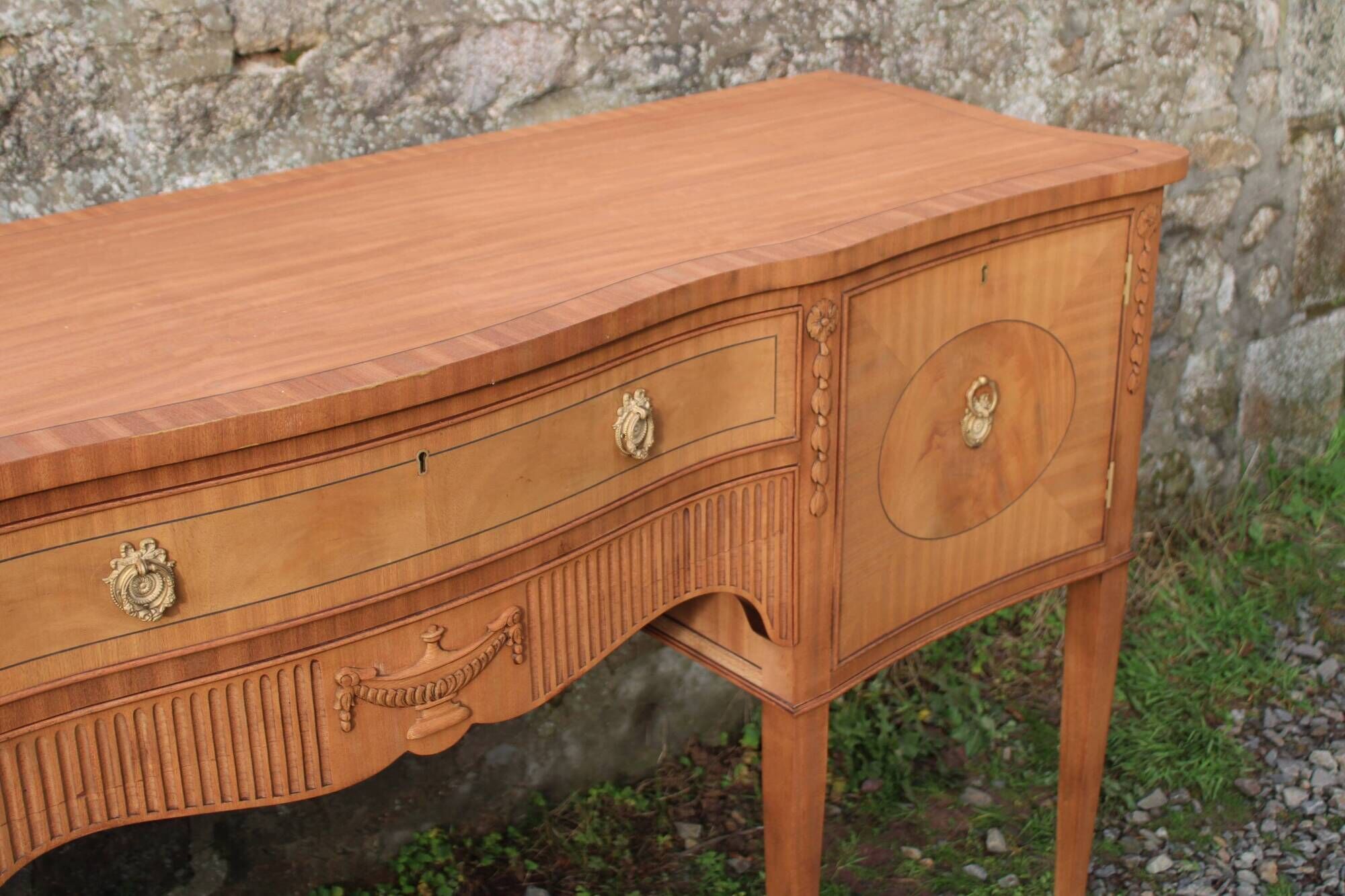 English-made enfilade in Louis XVI style with light wood veneers.
