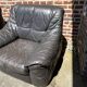 Pair of patinated leather club armchairs