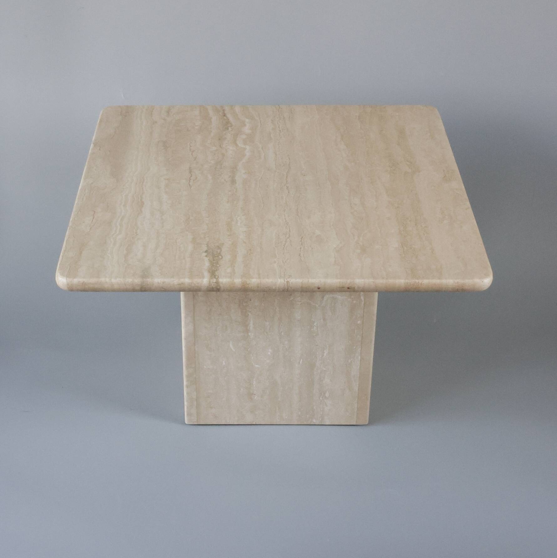 Travertine side table