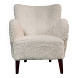 Danish lounge chair with new curly fur upholstery