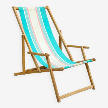 Folding deckchair in wood and vintage canvas