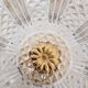 Chiseled crystal bowl with gilded metal base