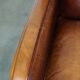 Set of 2 subtle sheepskin leather armchairs with a beautiful warm color scheme