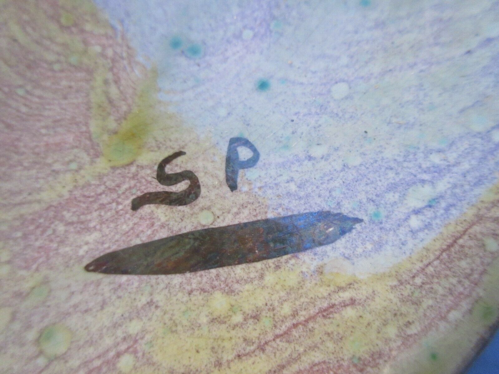 Dabbling plate with trompe l'oeil fish, signed sp,