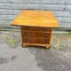 Small English chest of drawers with a folding top.
