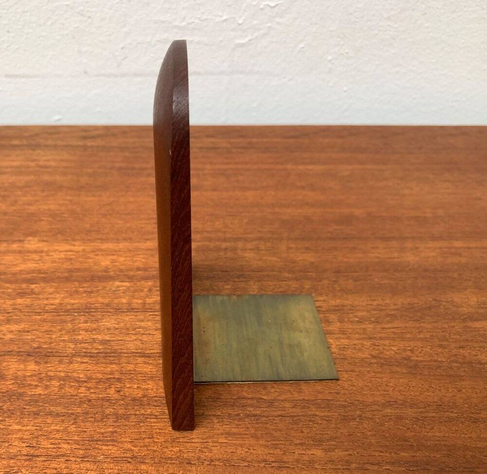 Mid-century Scandinavian bookends in teak and brass.