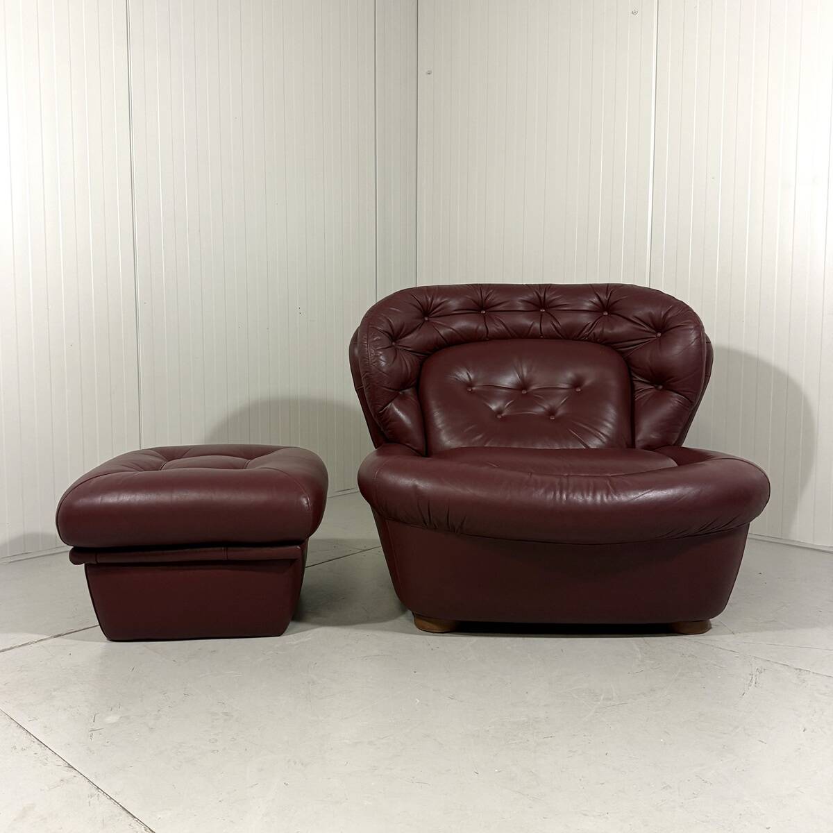 French burgundy leather space age lounge chair & footstool 1970’s