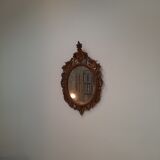 Italian mirror in gilded scupted wood
