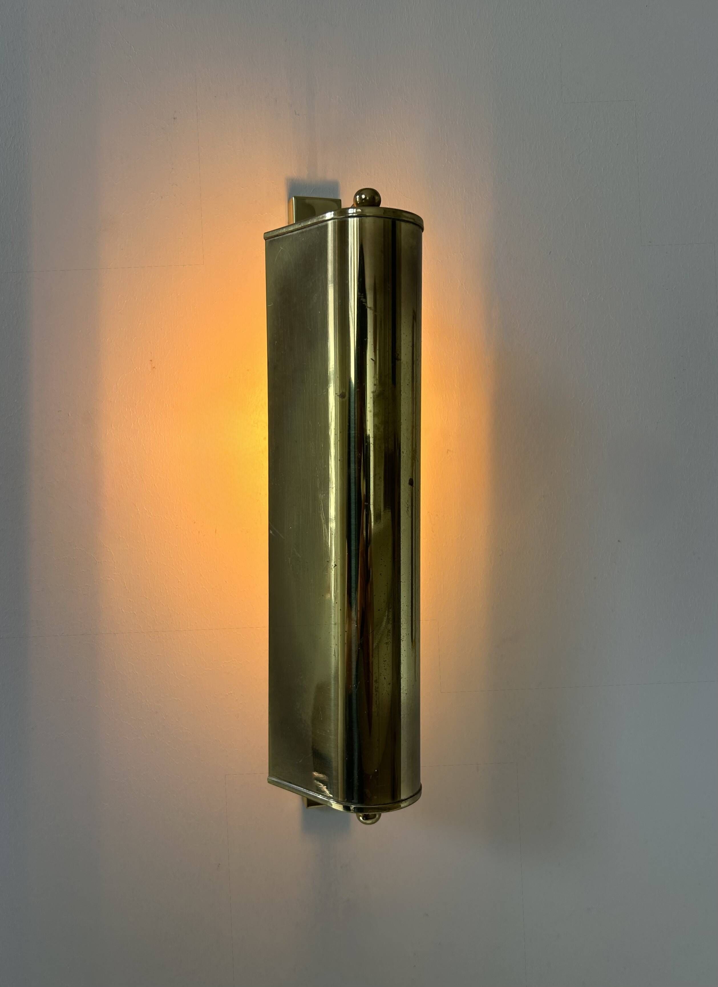 Pair of vintage adjustable brass wall lights, France, 1960s
