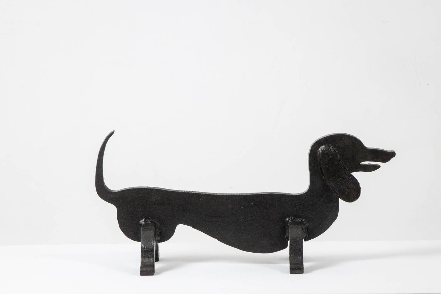 Edouard Shenck. Pair of zoomorphic andirons in wrought iron. 1950s.