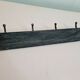 Coat rack in patinated wood and cast iron hooks