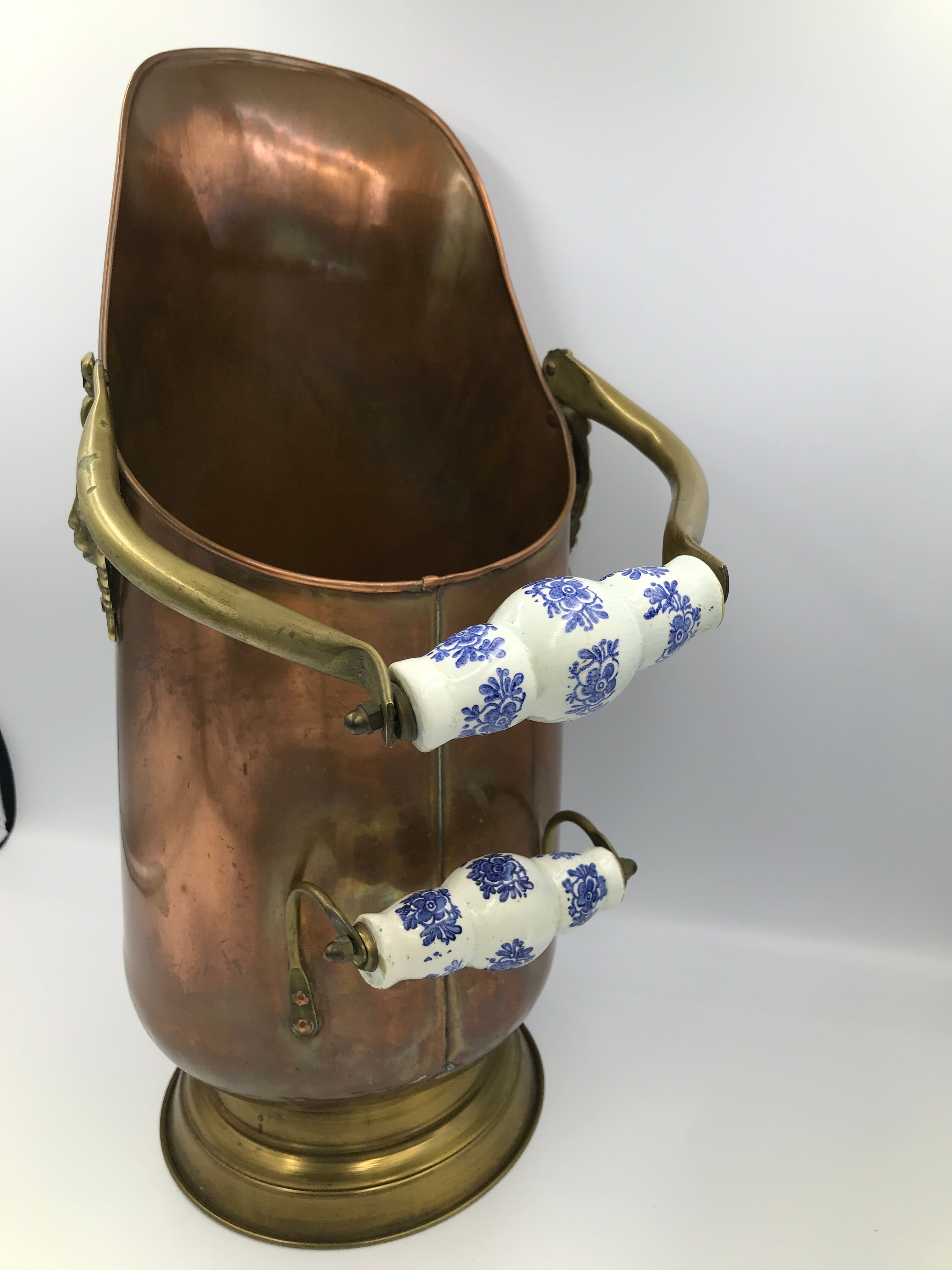 Copper umbrella holder and vintage porcelain handles