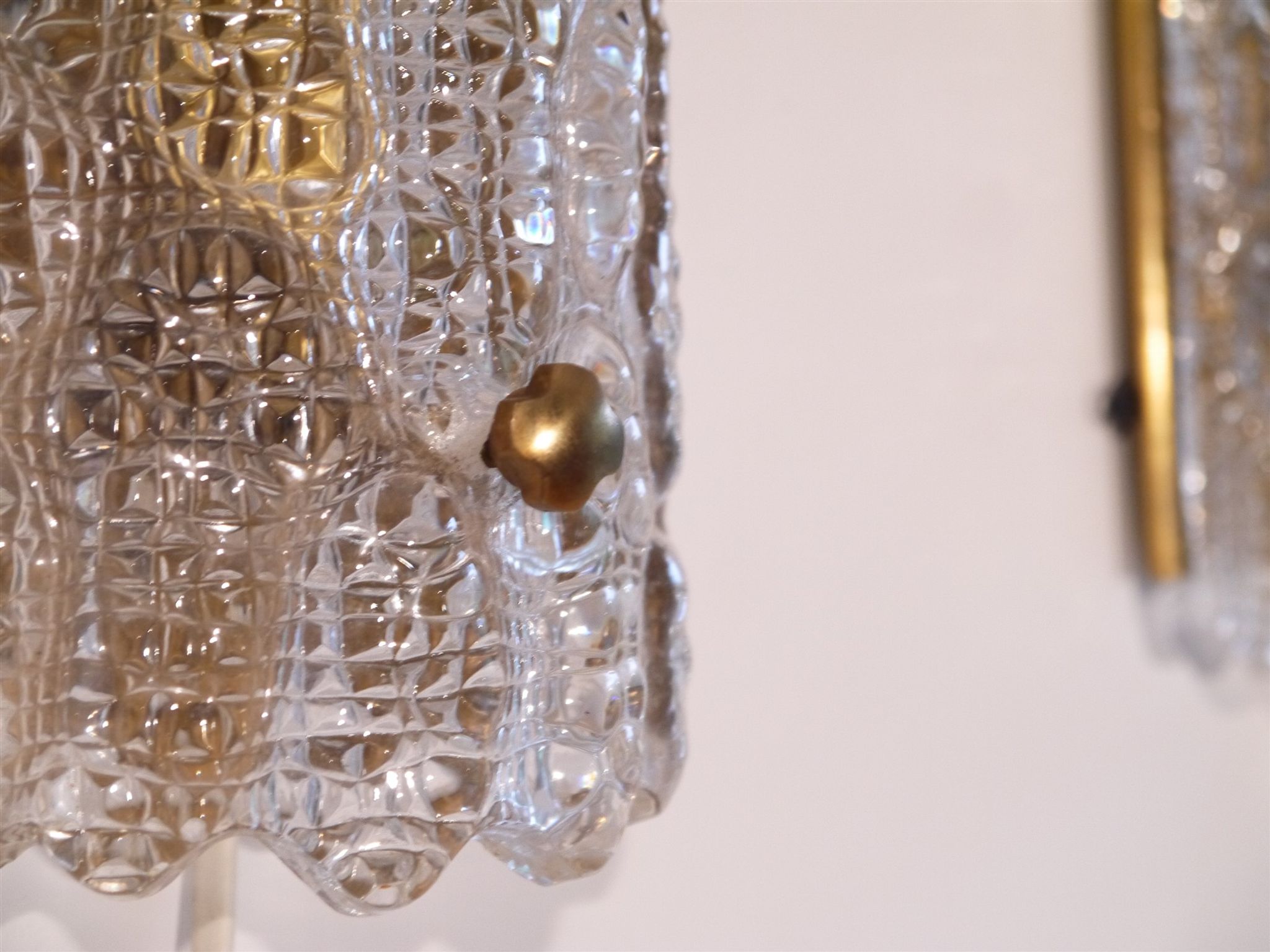 Pair of brass and crystal appliques by Carl Fagerlund for Orrefors