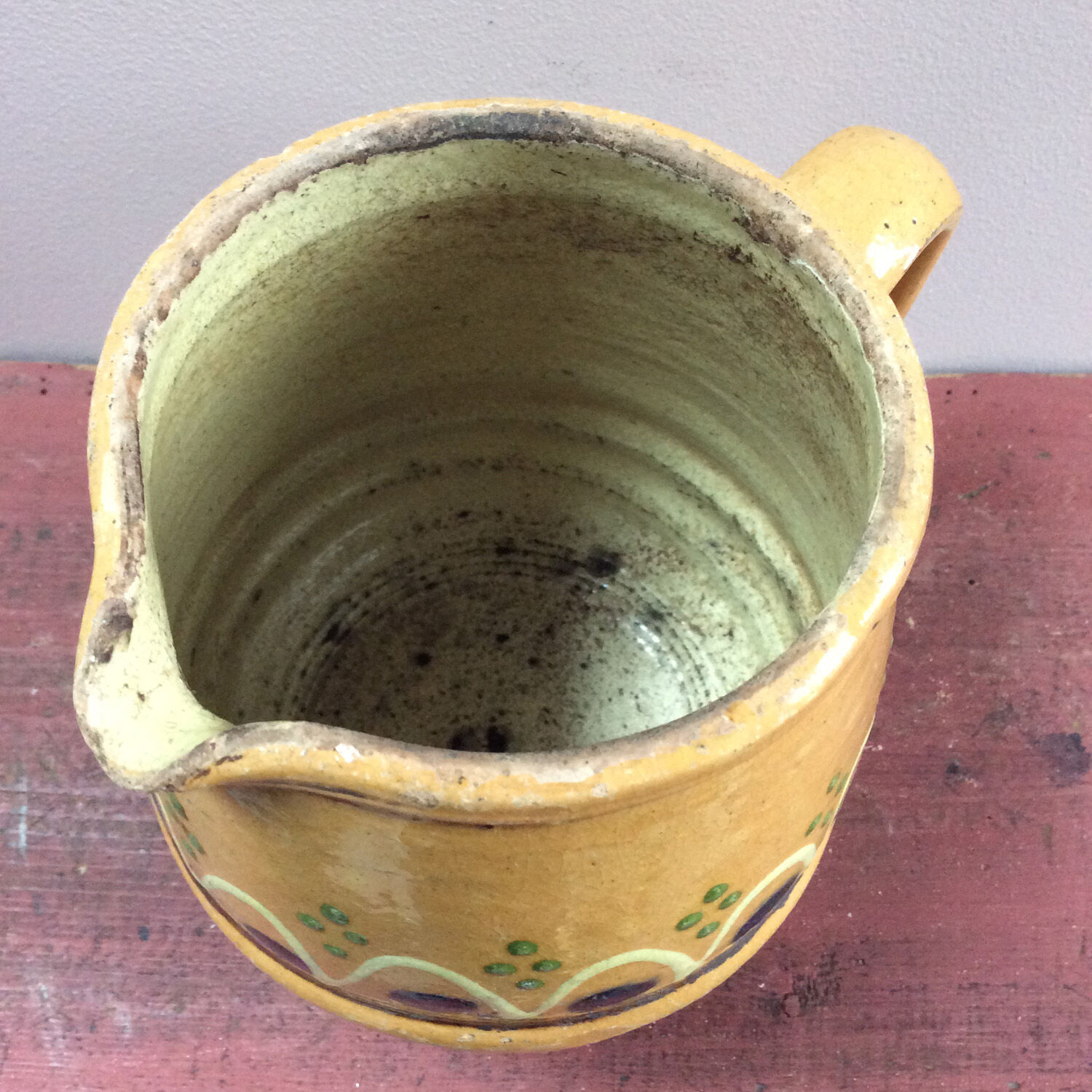 Glazed pottery pitcher