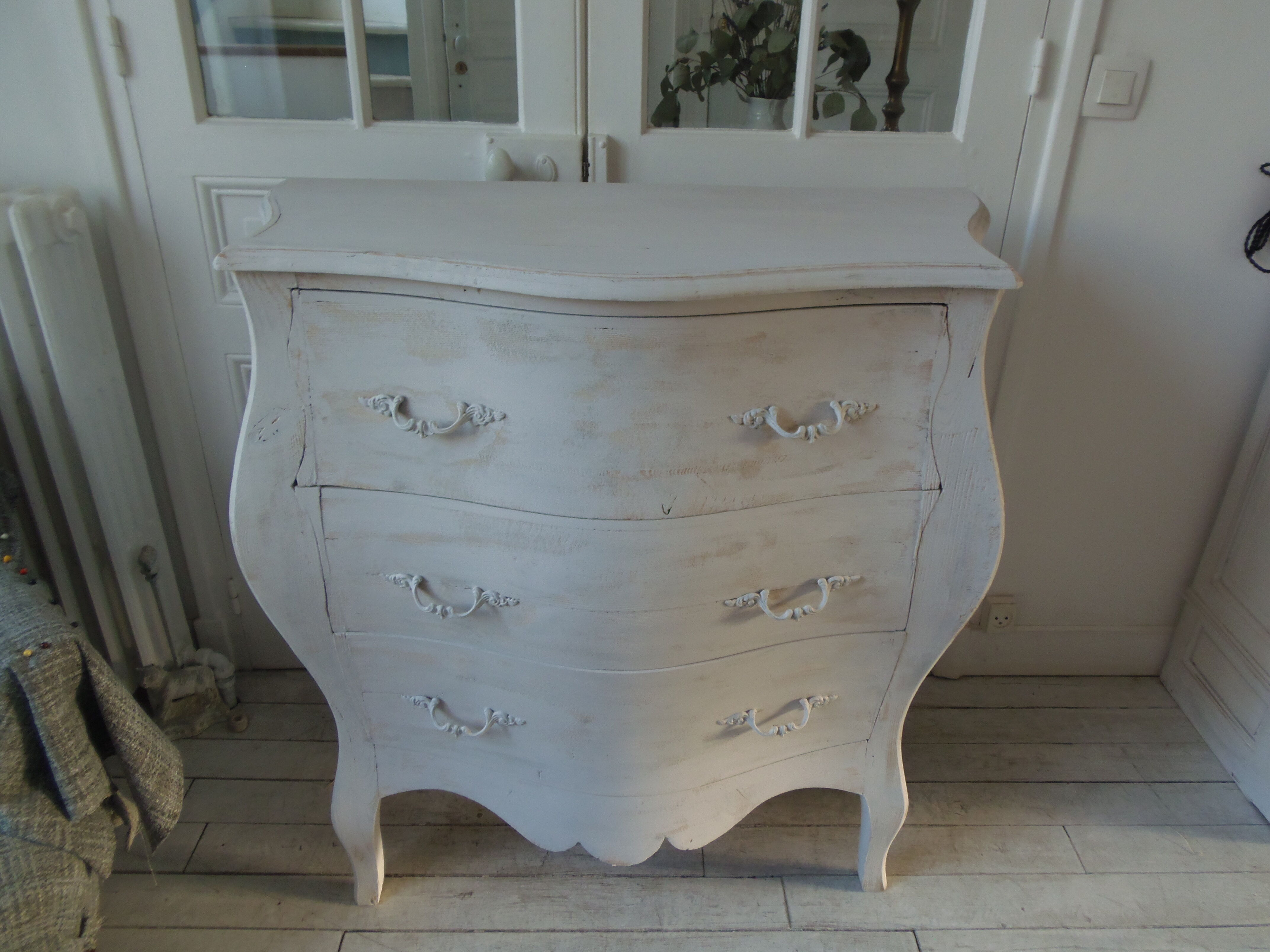 Curved patinated chest of drawers pearl grey waxed finish