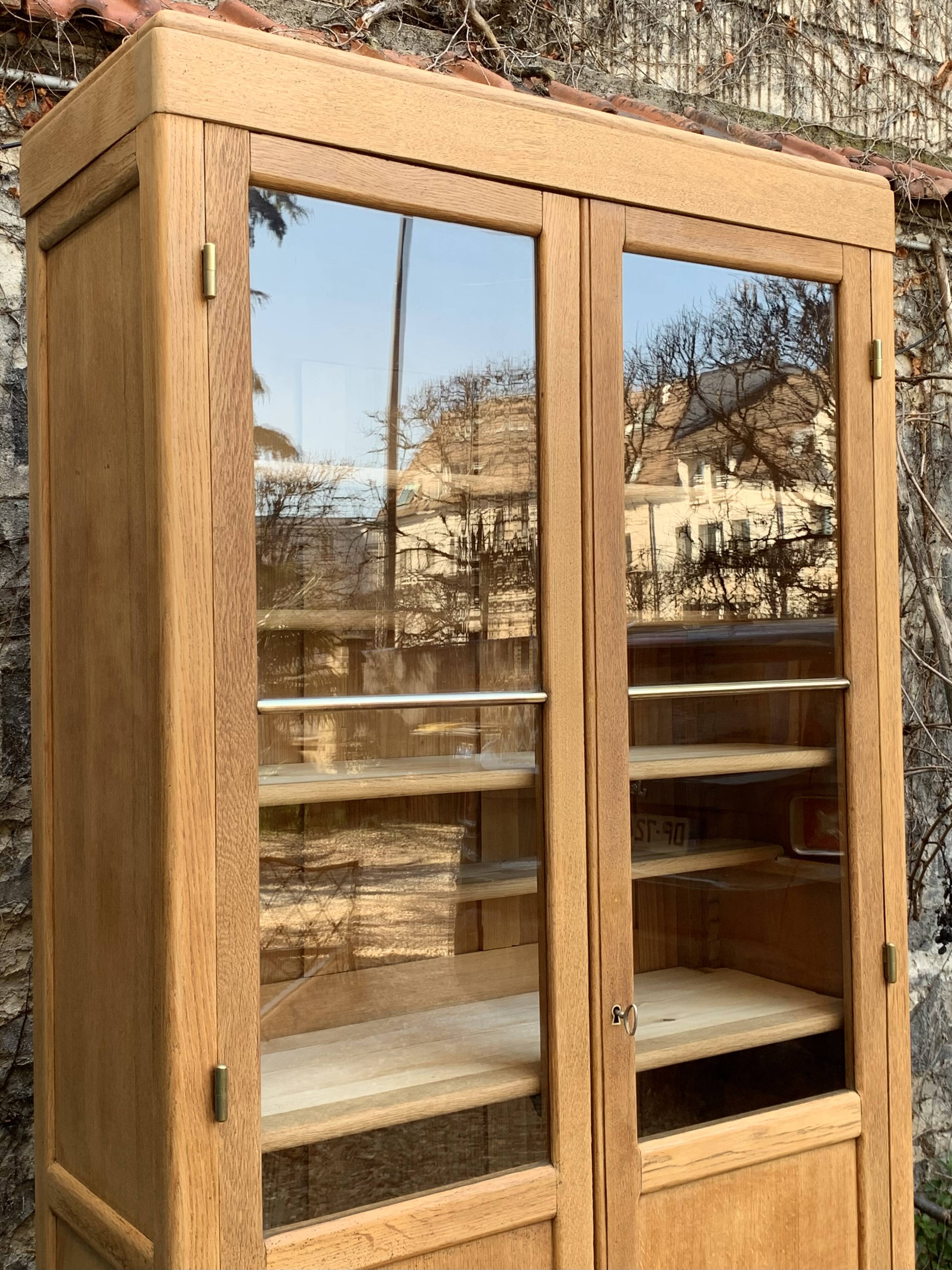 Parisian glass cabinet in solid raw oak, 1950