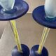 Duo of vintage Kosta Boda candlesticks in glass paste
