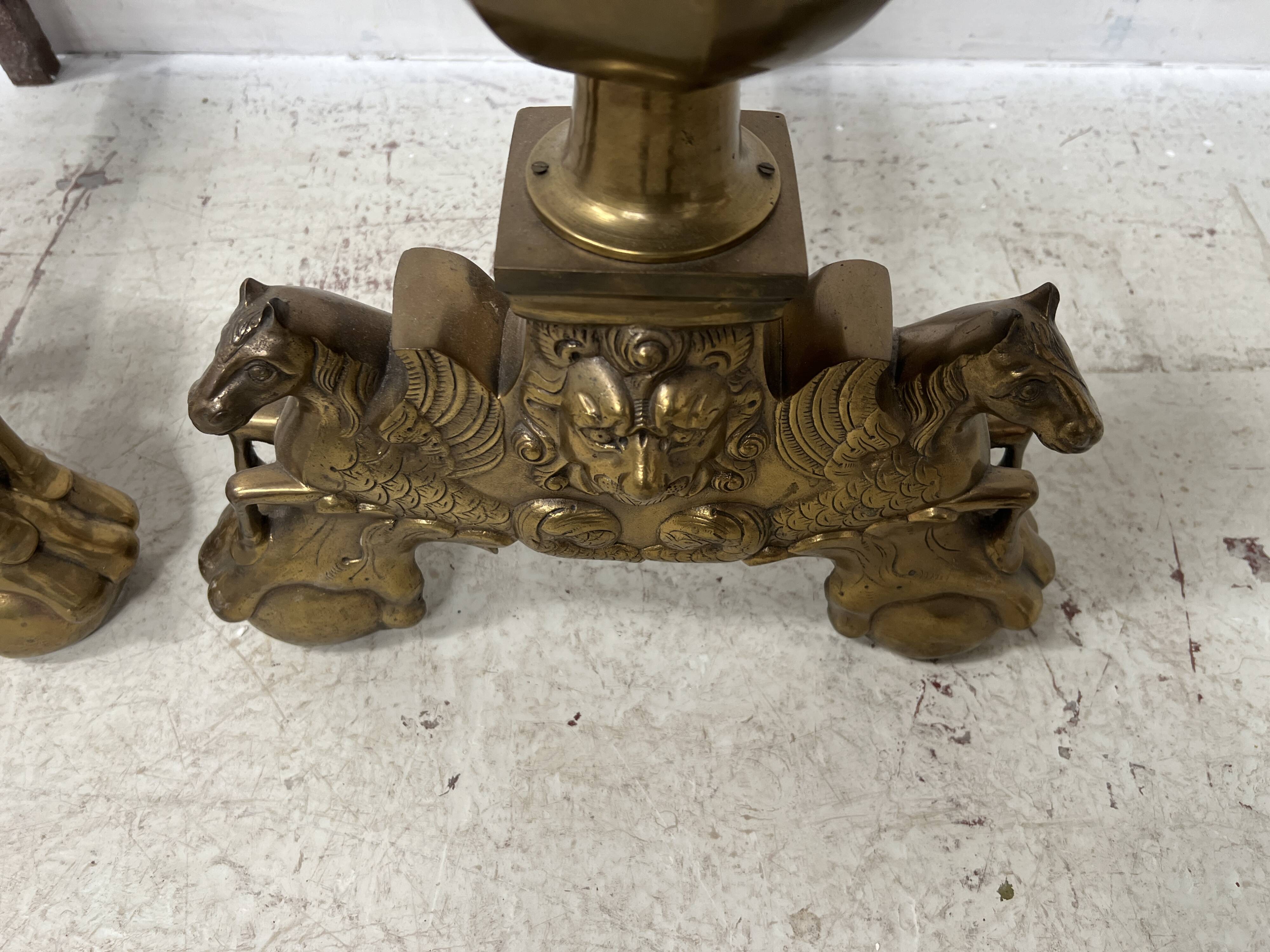 Important pair of brass log holders from the 20th century.