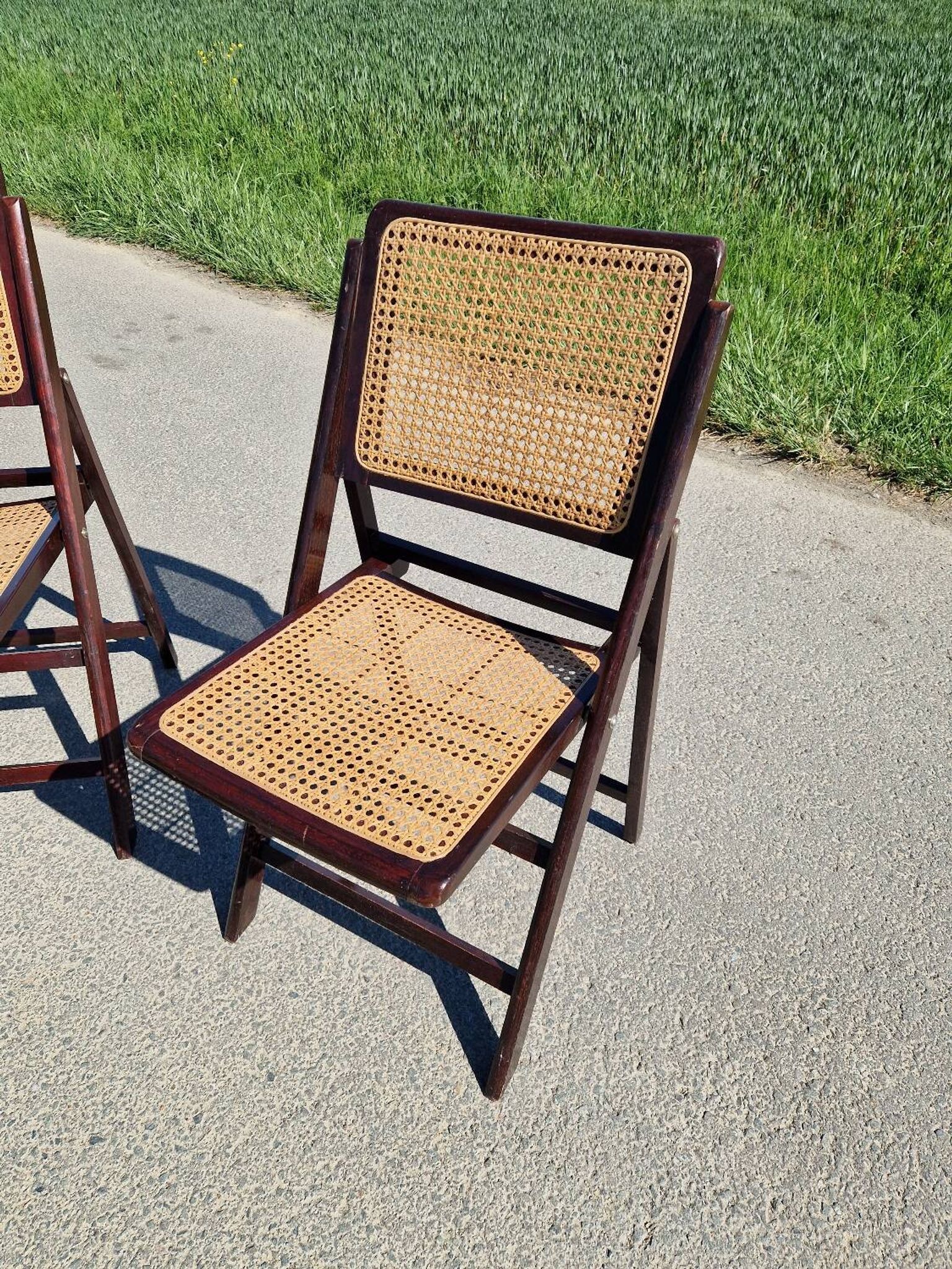 Lot de 2 chaises pliantes en bois et cannage