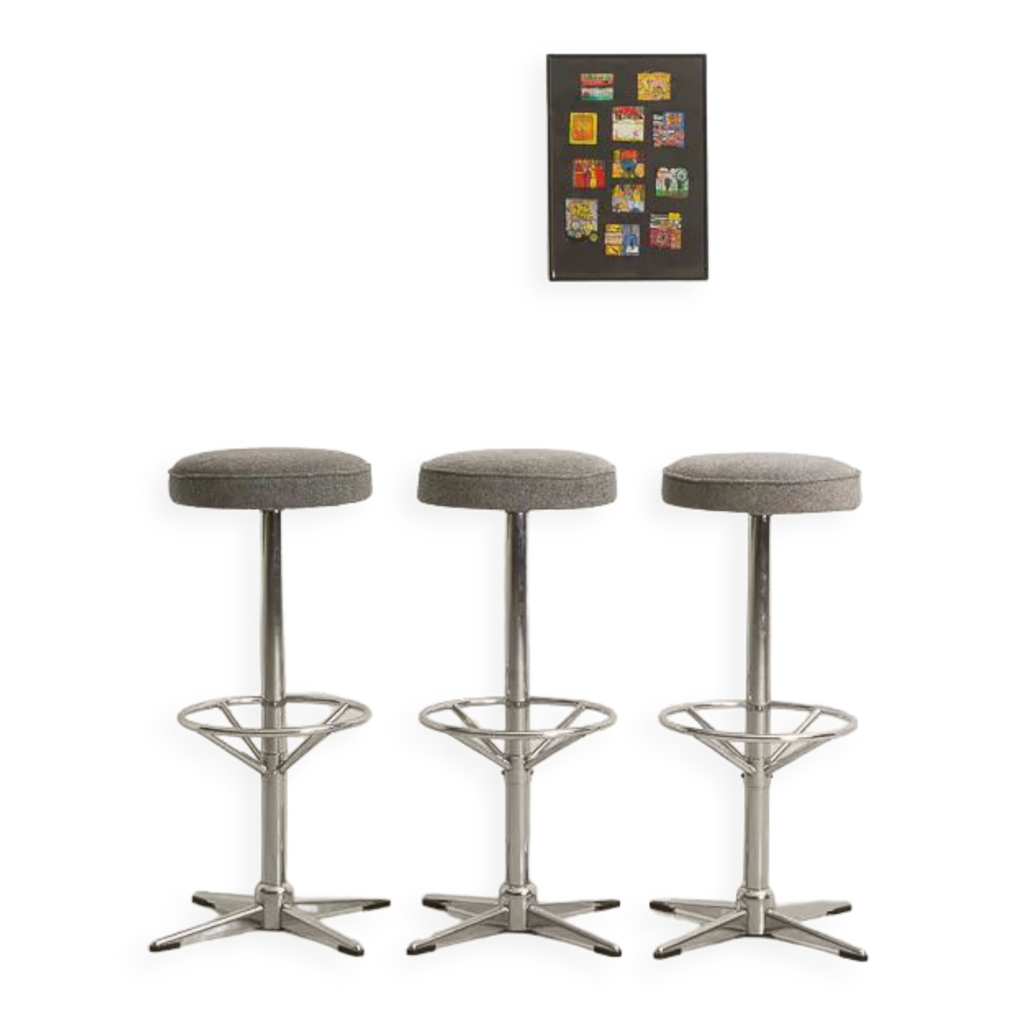 Trio of bar stools with restored seating and chrome-plated steel legs