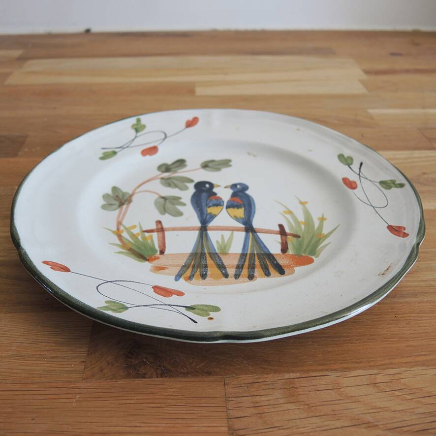 Old hand-painted ceramic plate: 2 birds on a fence.