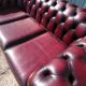 Burgundy Chesterfield-style sofa