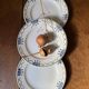 3 dessert plates stamped in art deco style.