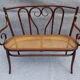 Curved wooden lounge 1900, a bench and four chairs