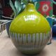 Green ceramic vase with stamp