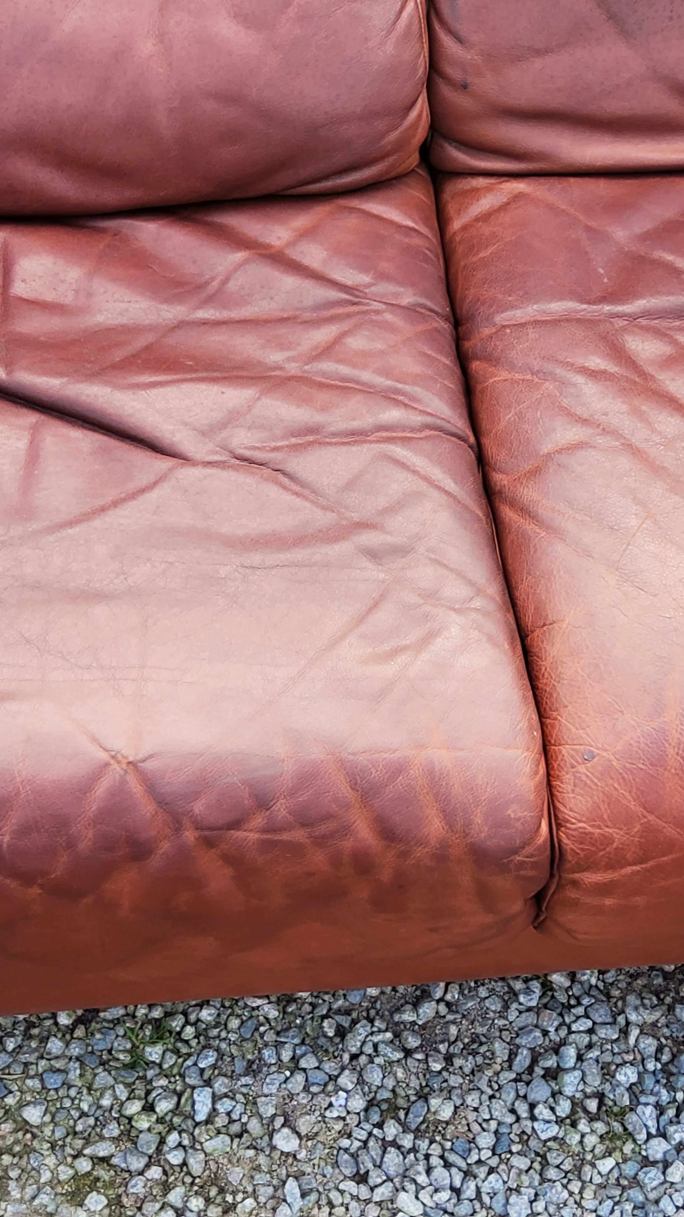 Pair of armchairs and De Sede sofa in cognac leather from the 70s/80s