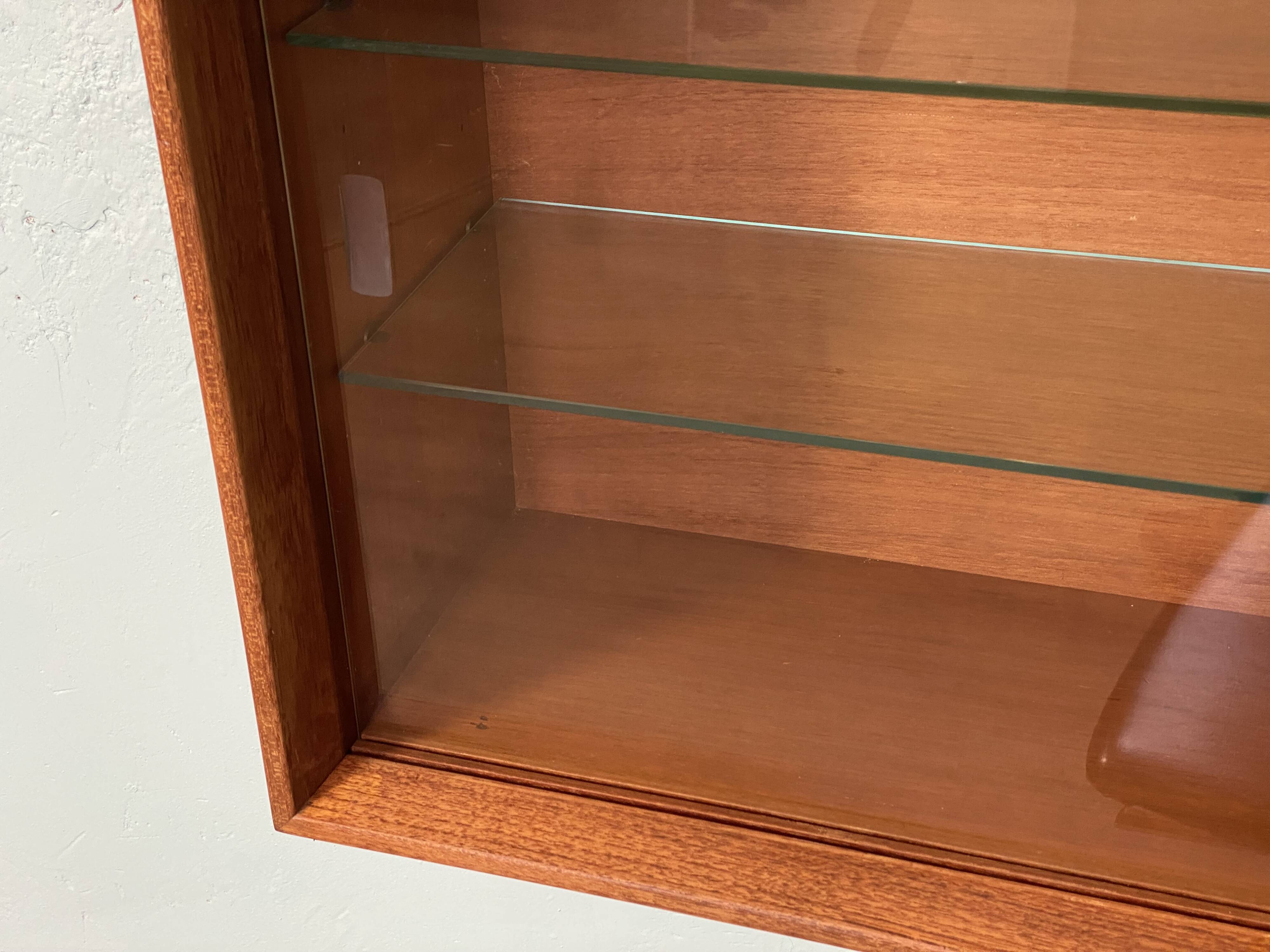 Scandinavian teak wall display cabinet from the 60s