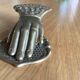 Brass paper press hand shape