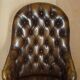 Fauteuil Chesterfield vintage en cuir vieilli