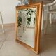 Miroir doré vintage à glace biseautée