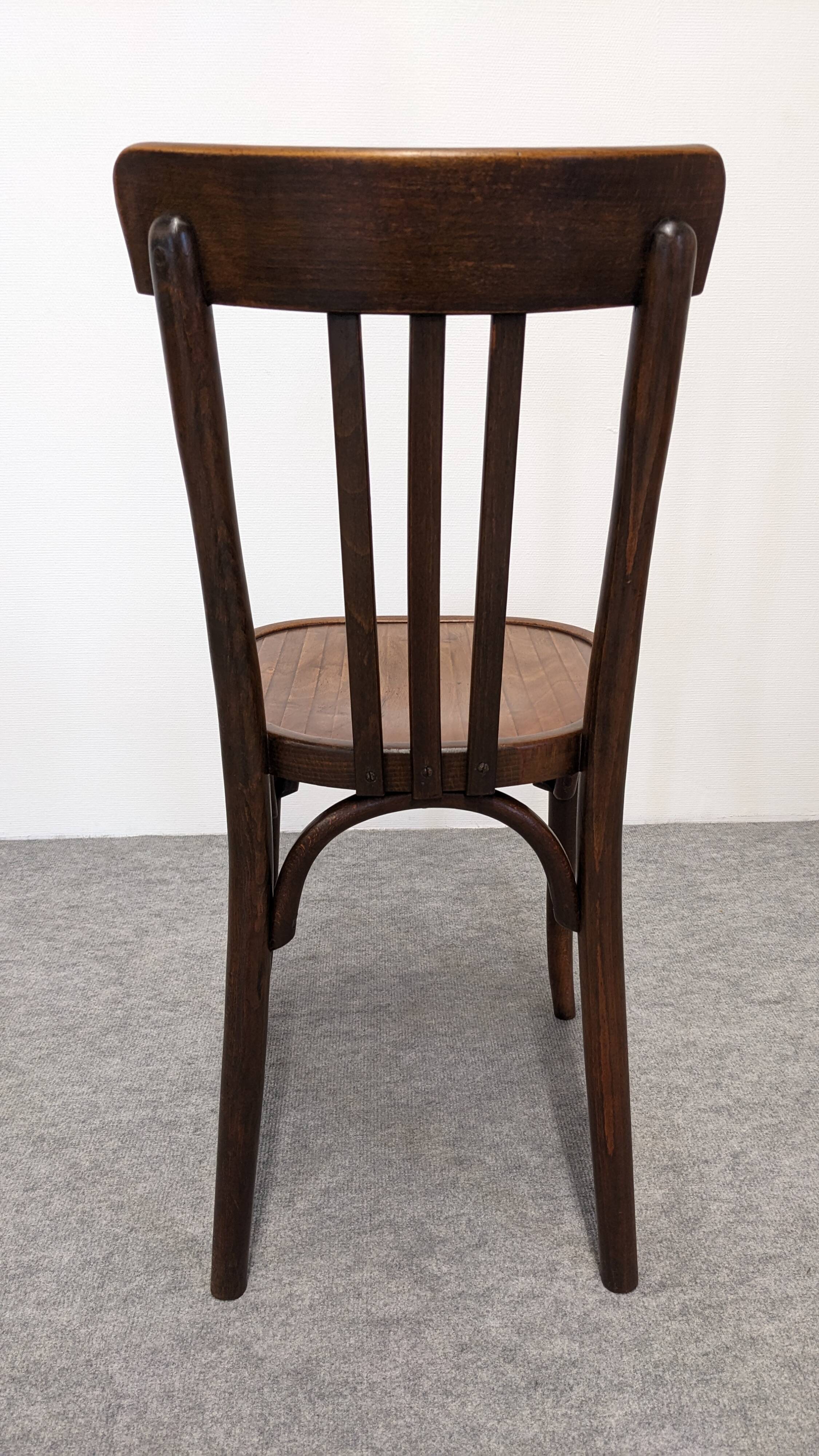 Set of 8 Baumann bistro chairs in bent beech, France circa 1930.