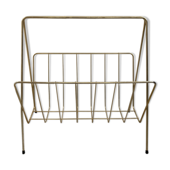 golden metal magazine rack from the 60s