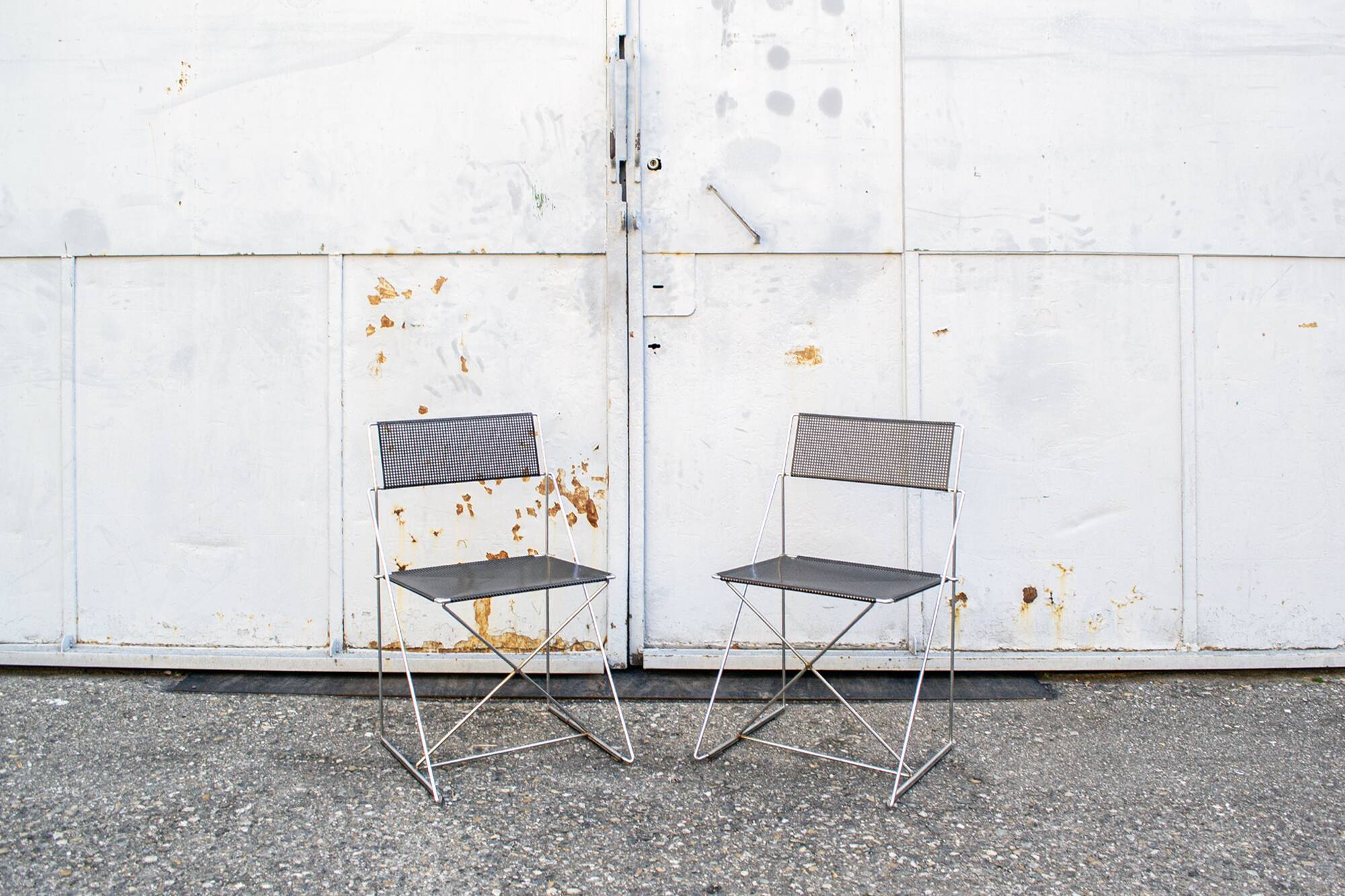 X-line chairs by Niels Jorgen Haugesen for Magis 1977