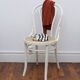 White wooden chair with cannage