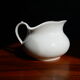 White ceramic water pitcher broc pot
