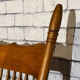 Wooden armchair with high back