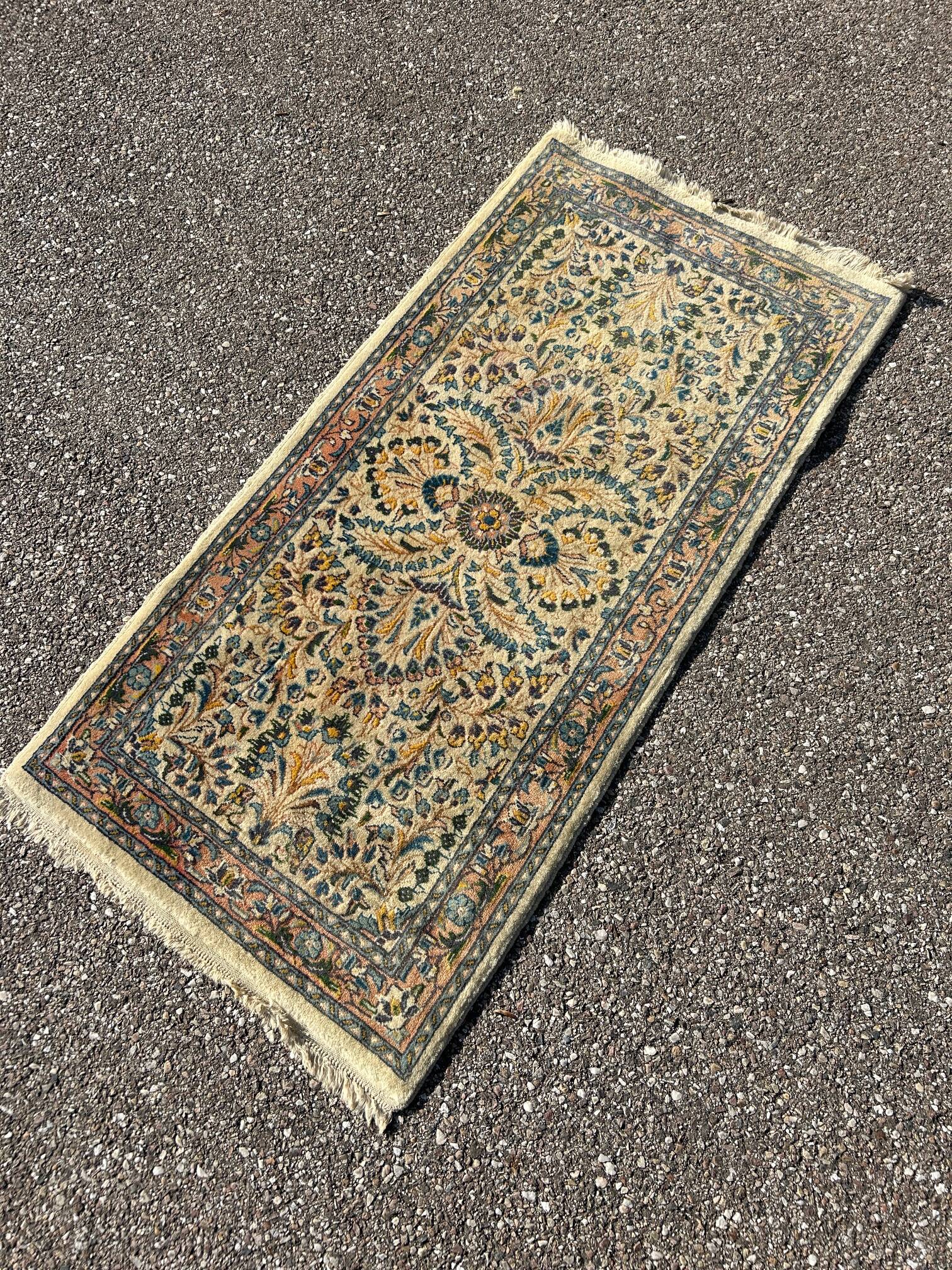 Persian rug 64cm by 133cm