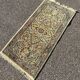 tapis persan 64cm par 133cm