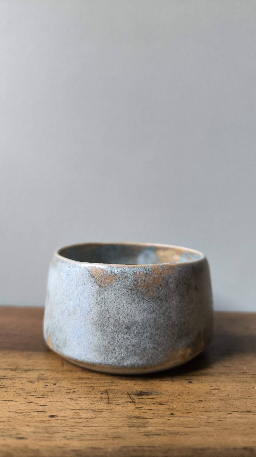 Handmade ceramic stoneware mug with blue enamel