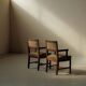 Pair of modernist armchairs in solid oak, France, circa 1940.