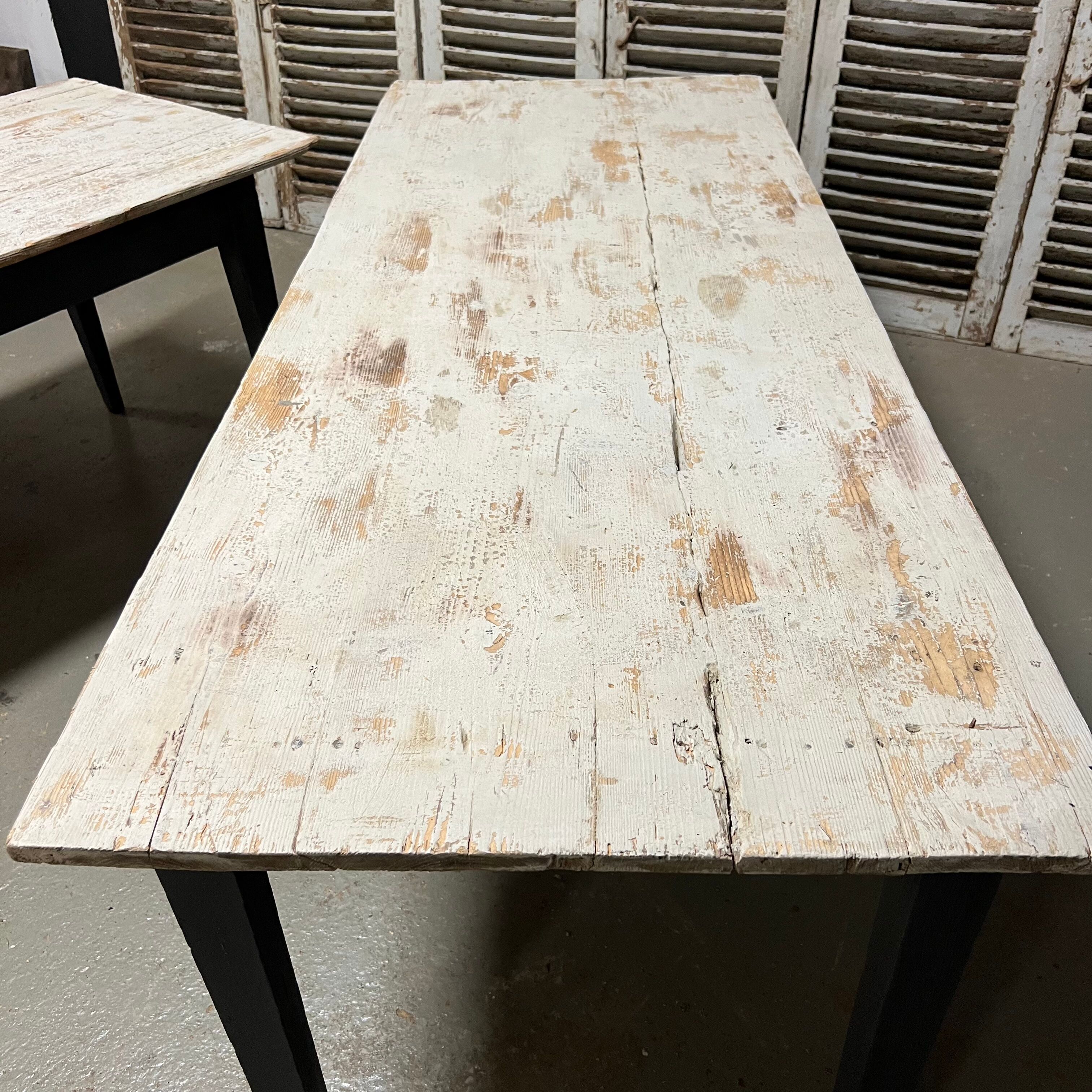 Black farmhouse table and white patinated top